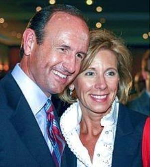 Elisabeth DeVos's mom, Betsy DeVos and dad, Dick DeVos.